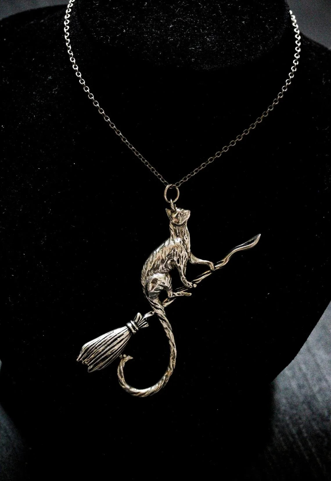 Cat Riding Broomstick Necklace Main image