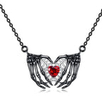 Silver Amulet Of Skeleton Hands and Heart