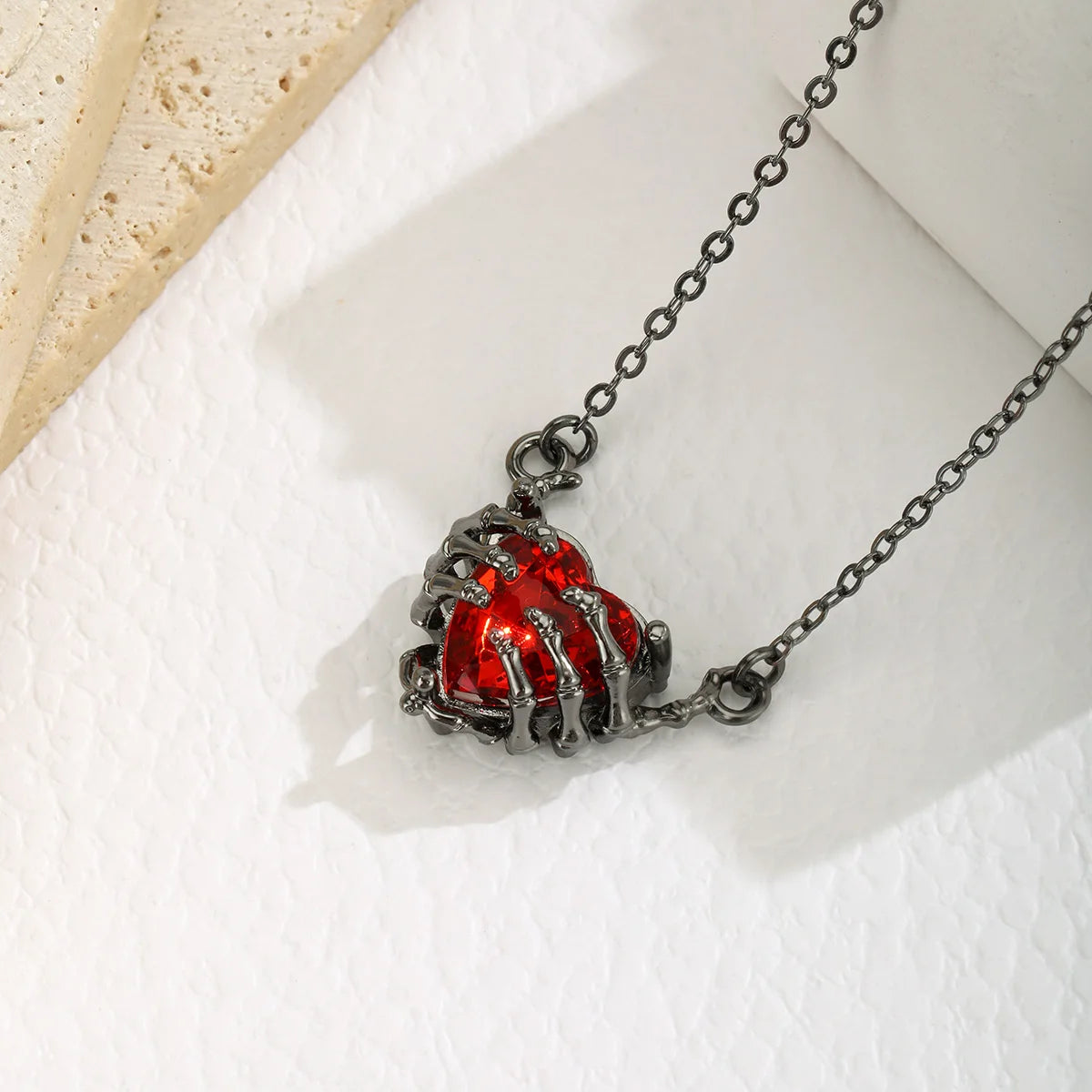 Silver Amulet Of Skeleton Hands and Heart