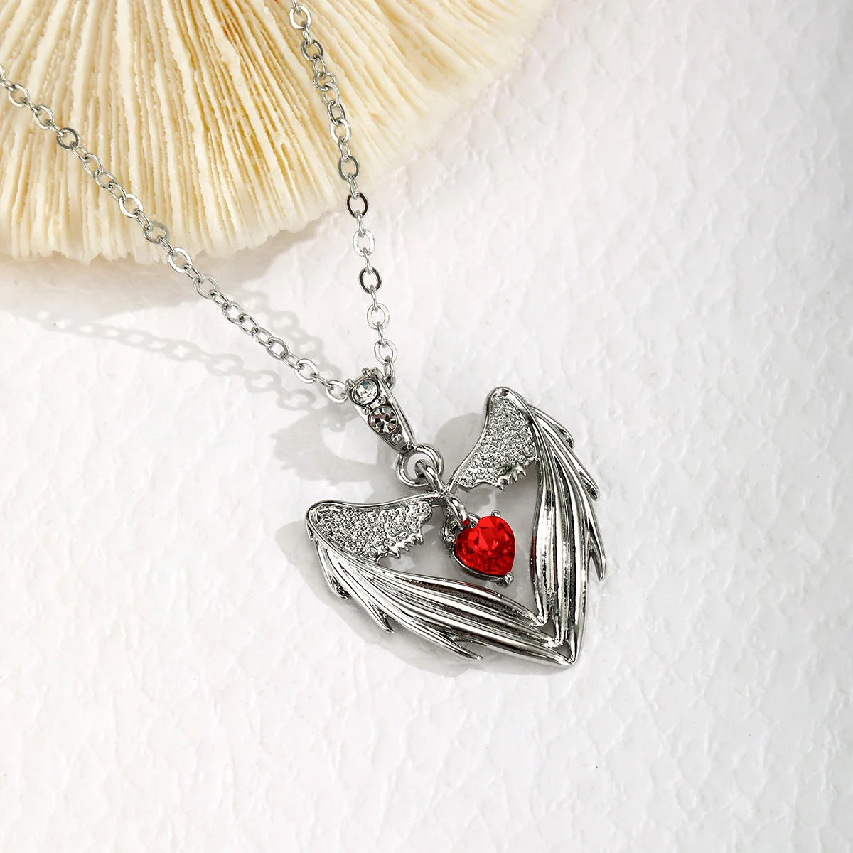 Silver Amulet Of Skeleton Hands and Heart